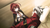 A bedridden Ragna the Bloodedge is attended to by Celica A. Mercury, Ragna appears to be experiencing discomfort.